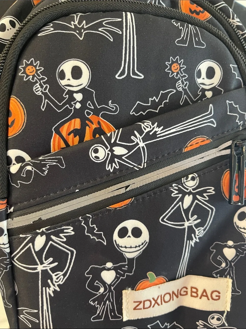 Halloween Jack Skeleton Sling Backpack - Black & Orange